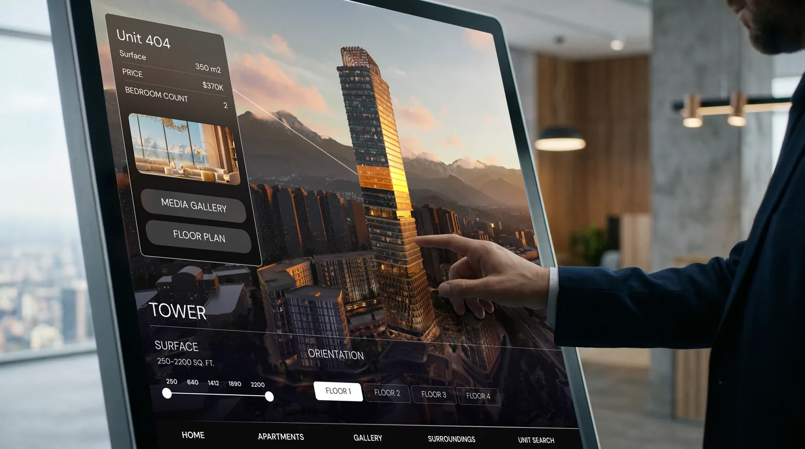 Buyer using a floor-standing touchscreen to explore a unit in the digital twin